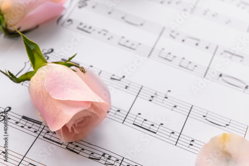 Music sheets and flowers, c...