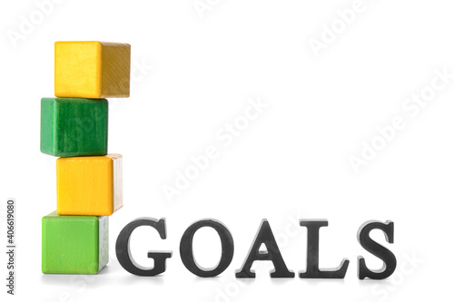 Word GOAL and wooden cubes ...