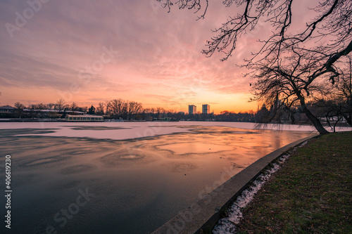 Sunset over winter landscape in a park in Bucharest, Romania