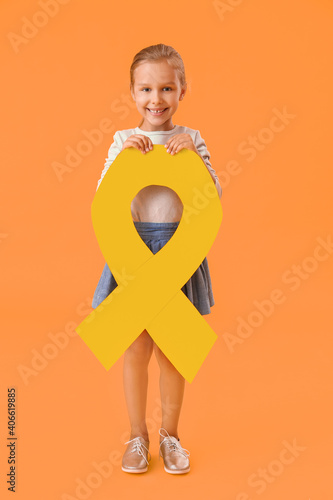 Little girl with golden rib...
