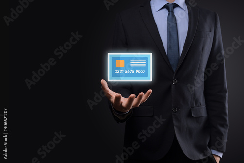 Wallpaper Mural Business man in suit hand holding blank credit card icon showing for concept banking and finance service Torontodigital.ca