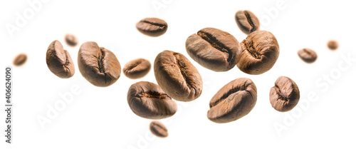 Coffee beans levitate on a white background