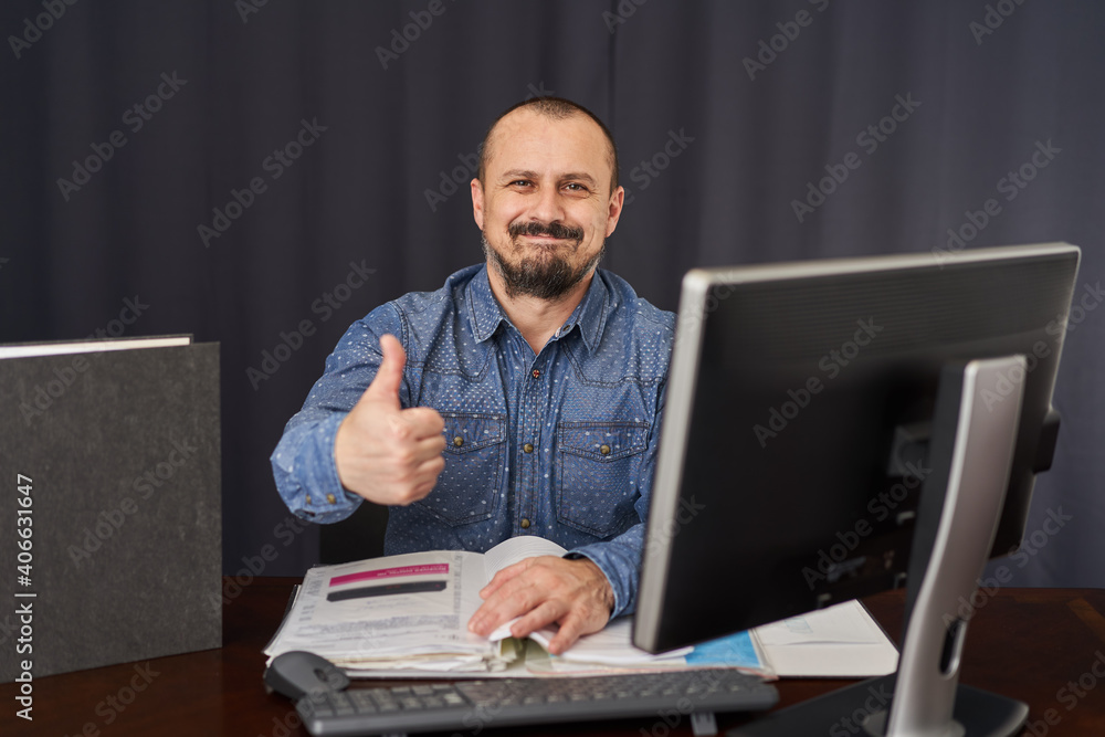 Businessman working with his computer Businessman working with his computer