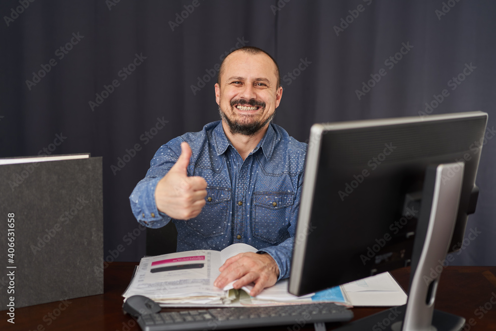 Businessman working with his computer Businessman working with his computer
