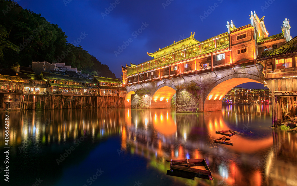Hong bridge (Rainbow bridge) at night in Fenghuang old city ,Hunan Province, China