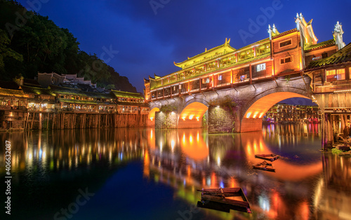 Hong bridge (Rainbow bridge) at night in Fenghuang old city ,Hunan Province, China
