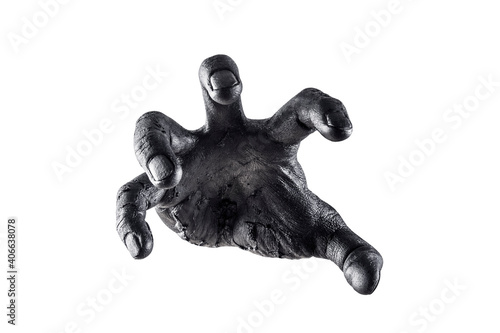 Creepy zombie hand isolated on white background with clipping path photo
