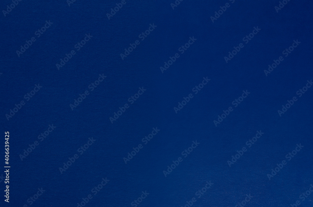 Dark blue paper background, blank, top view. Dark blue paper background, blank, top view.