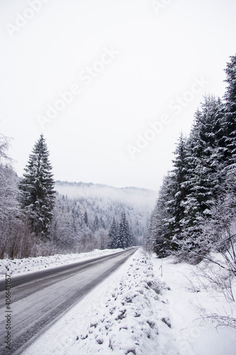 winter road in the mountains and trees with snow. Poland