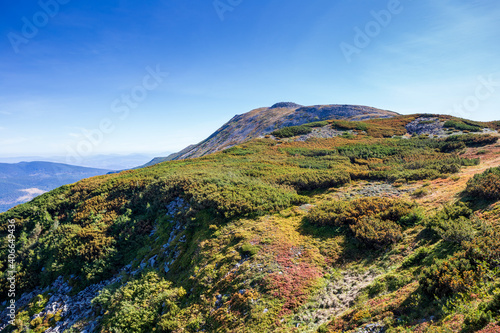 The peak of Babia Gora in Beskid Sadecki in Poland, mountain landscape on a sunny summer day photo
