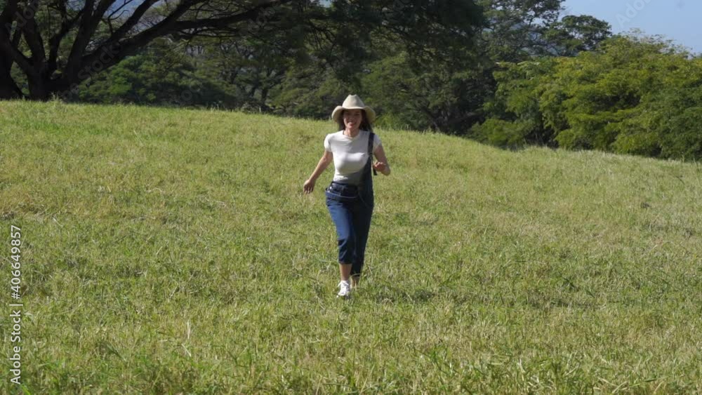 Cute young women laughing and having fun walking and running on a dairy farm, World Women's Day. Cute young women laughing and having fun walking and running on a dairy farm, World Women's Day.