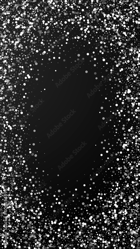 Obraz premium Random white dots Christmas background. Subtle flying snow flakes and stars on black background. Actual winter silver snowflake overlay template. Extraordinary vertical illustration.