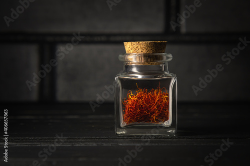 Photography Red saffron spice on a dark background