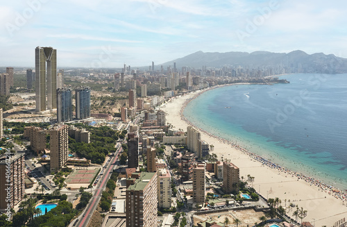 Aerial view of the city of Benidorm, Alicante on the Costa Blanca of Spain. Poniente beach and skyline in summer