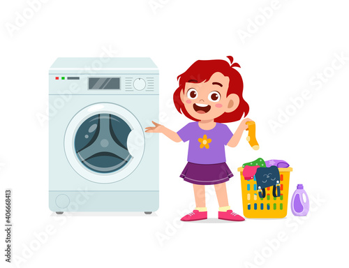 happy cute kid do laundry with washing machine