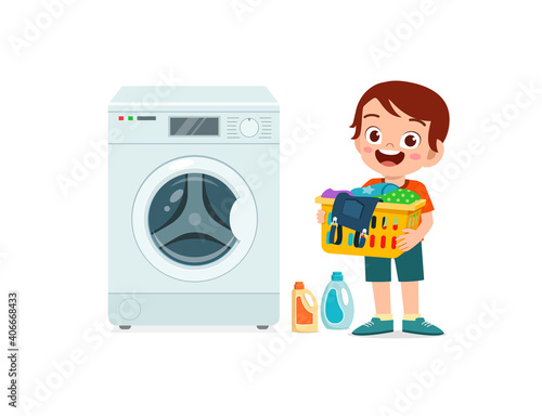 happy cute kid do laundry with washing machine