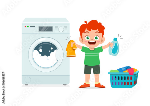 happy cute kid do laundry with washing machine
