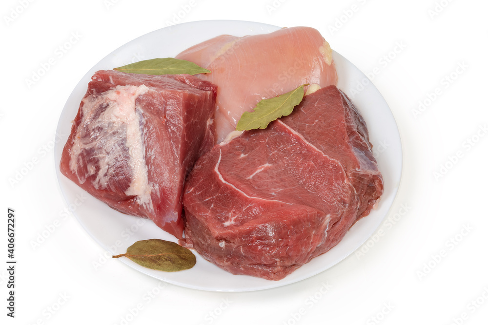 Different uncooked boneless meat on dish on a white background
