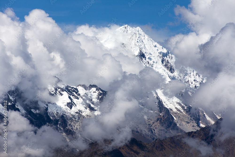 Mount Salkantay in the middle of clouds Andes Peru Mount Salkantay in the middle of clouds Andes Peru