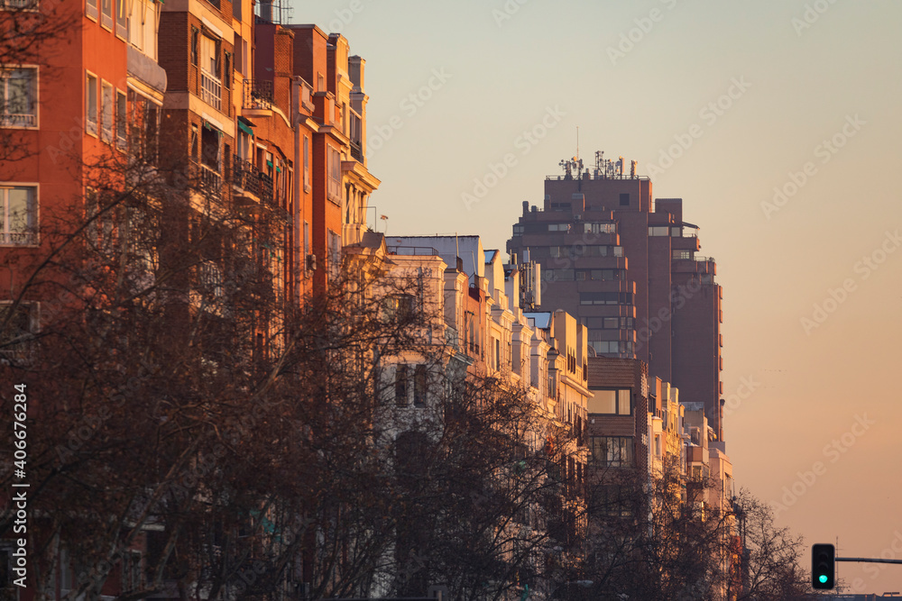 General view of the rooftops of Menedez Pelayo avenue with the Torre del Retiro in the background, on a cold sunset after the polar storm Filomena.