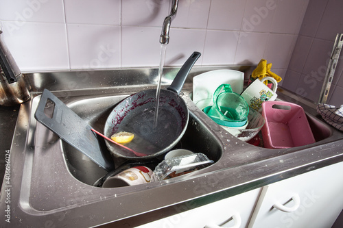 Crockery in the sink in the kitchen.