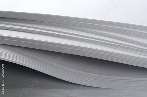 Closeup of stack of new white paper as a background