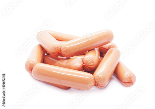 Pile of  sausages isolated on white background. long wieners in artificial casings. side view.  photo