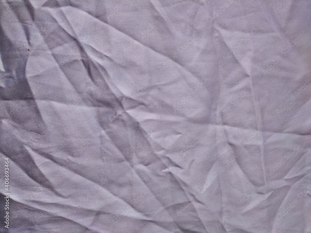 Fototapeta premium The white cloth is wrinkled because of the job.