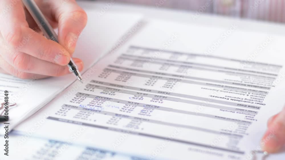 Shot of businessman checking the financial statement front view Shot of businessman checking the financial statement front view