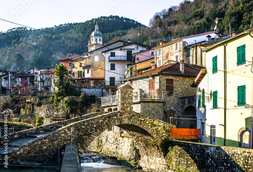 Fotografie Roman ancient stone bridge in italian village, Pignone, La Spezia, Liguria
