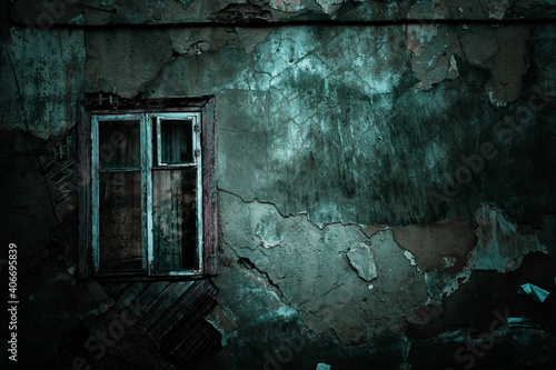 Horror concept background. Scary shabby old texture wall of ruined grunge house and closed window with mystical shadows causing fear