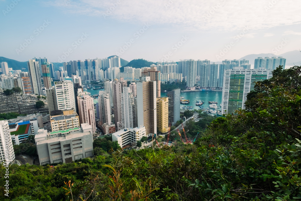 Obraz premium Panoramic Aerial view over Tin wan, Aberdeen and Ap Lei Chau district seen from Hong Kong Trail sec. 2, This is a popular hiking route for People living healthy active lifestyle outdoors.