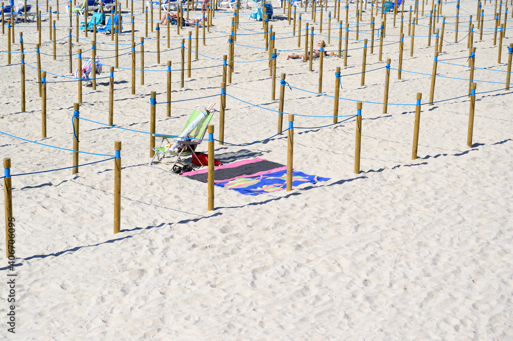 social distancing of people on the beach social distancing of people on the beach
