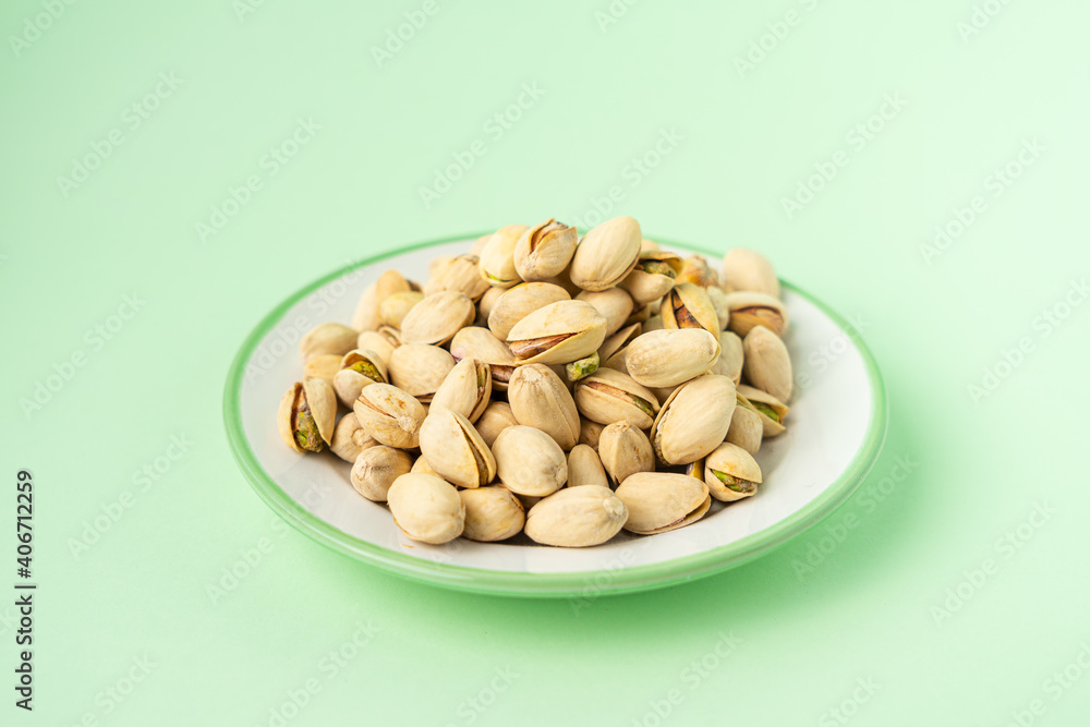 toasted pistachios in a plate. Nuts vegan protein toasted pistachios in a plate. Nuts vegan protein