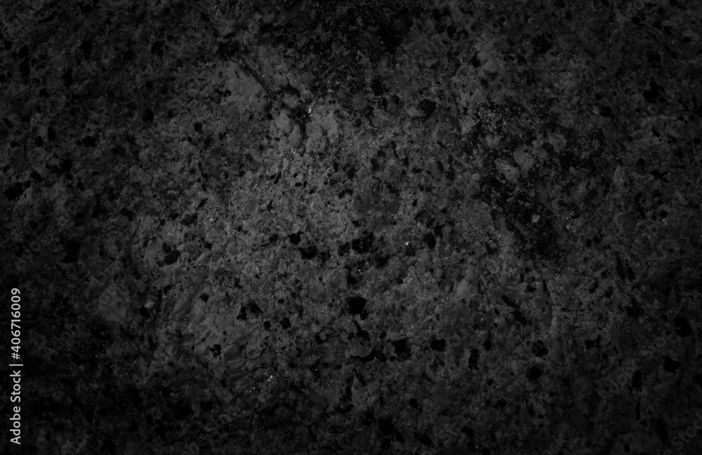 Fototapeta premium Dark tone granite surface. Intrusive igneous rock.