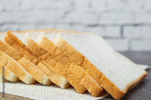 Sliced bread on dark grunge...