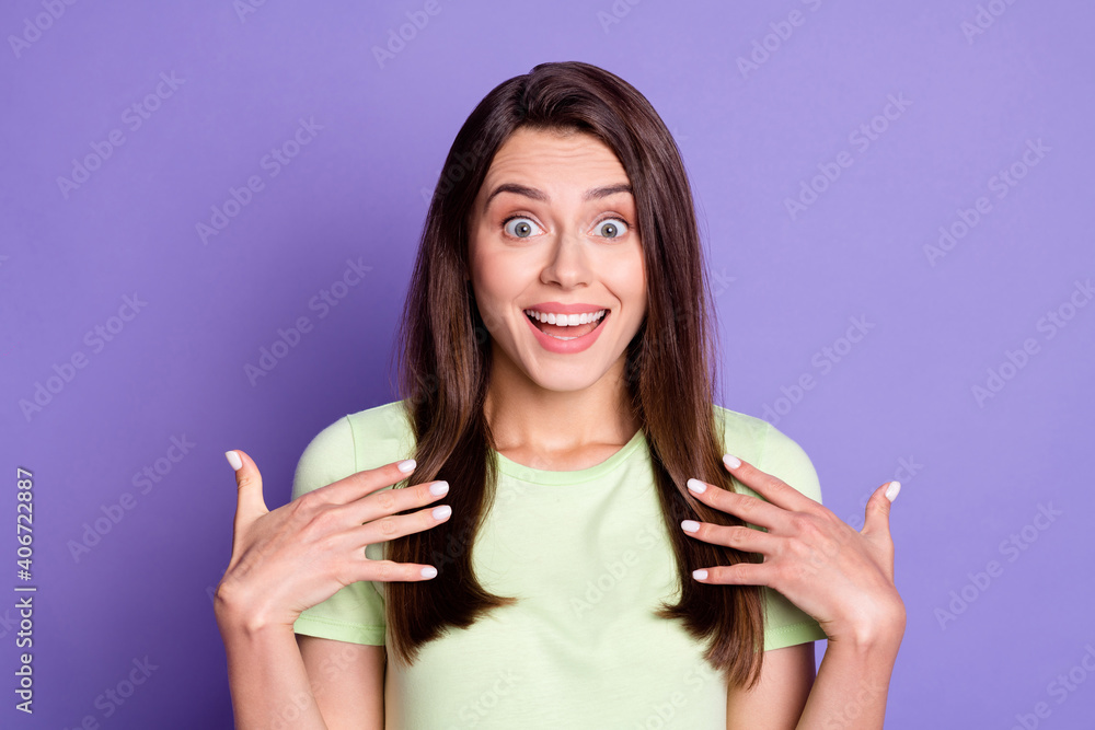 Close-up portrait of charming cheerful amazed lucky girl great success reaction isolated over bright violet color background Close-up portrait of charming cheerful amazed lucky girl great success reaction isolated over bright violet color background