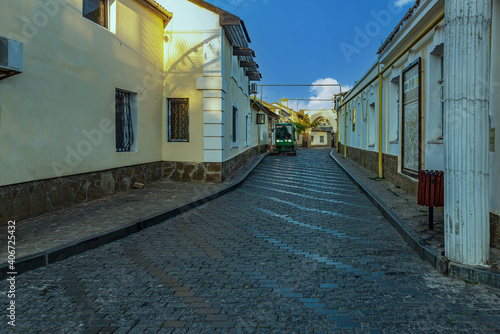 Cleaning of the street of the tourist route in the old town of Yevpatoria