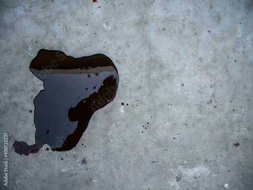 Spilled paint on the cement floor