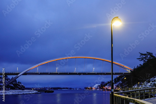 Canvas Print Stockholm, Sweden  The arched Svindersvik bridge at night.