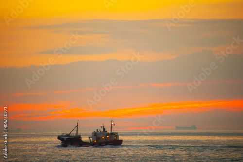 Sunset at at the fishing harbour around the sea coast