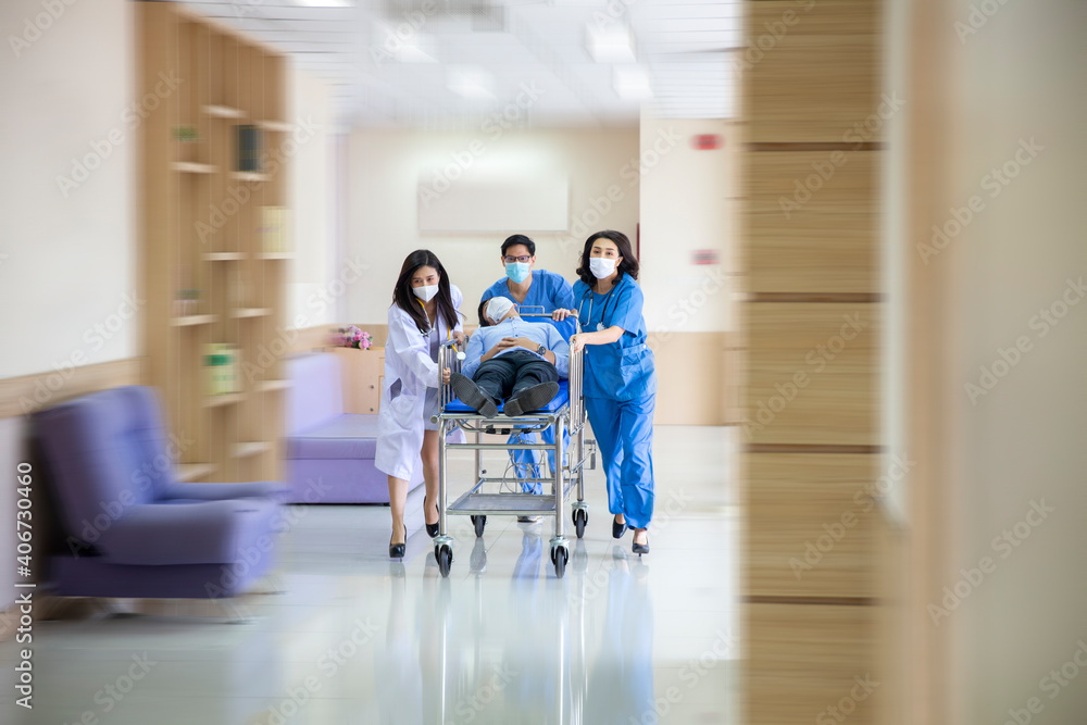 Group of doctor, Nurse and doctor in a hurry taking patient to operation theatre. Doctors running for the surgery. Team of doctors and surgeon rushing patient. Group of doctor, Nurse and doctor in a hurry taking patient to operation theatre. Doctors running for the surgery. Team of doctors and surgeon rushing patient.