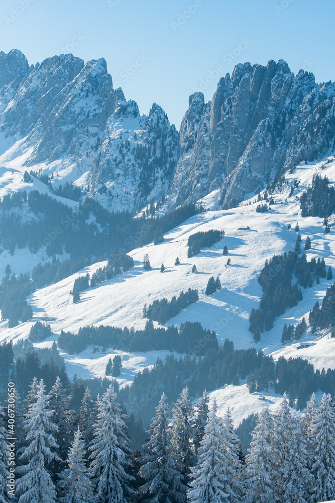 peaks of Gastlosen in dreamy winter landscape