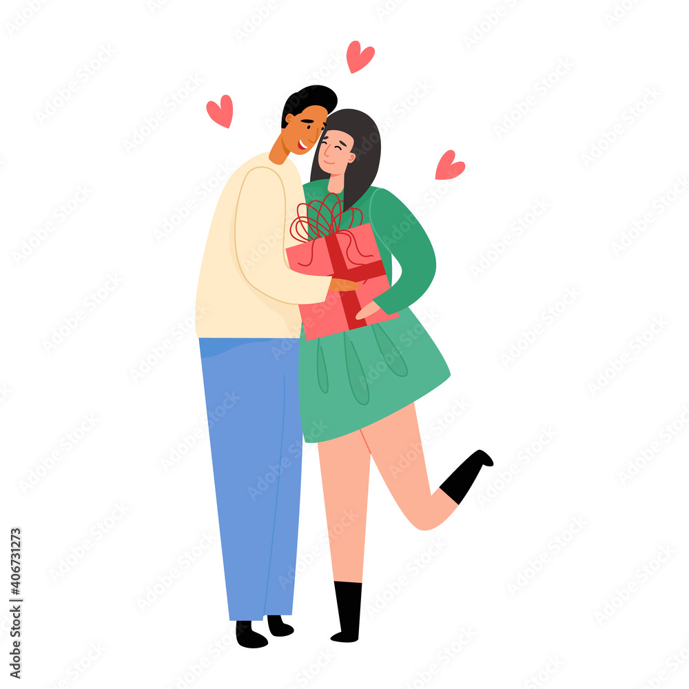Cute multiethnic couple in love. Man gives a Valentine's day gift to his beloved wife or girlfriend. Cute multiethnic couple in love. Man gives a Valentine's day gift to his beloved wife or girlfriend.