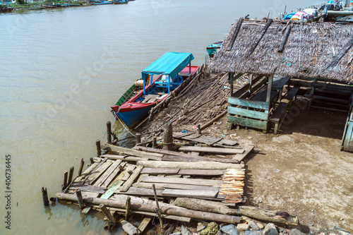 fishermen's houses and boats on the river