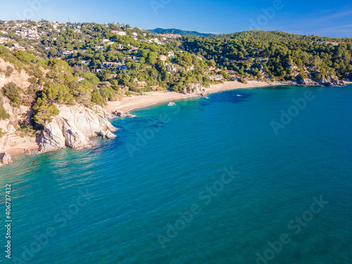 Fototapeta Naklejka Na Ścianę i Meble -  aerial images of lloret de mar virgin beach turquoise blue water without people transparent europe mediterranean sea