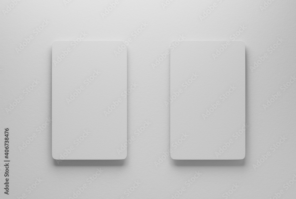 Mockup of two business cards on a paper table. 3D render. Mockup of two business cards on a paper table. 3D render.