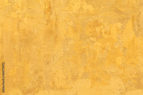Vintage Grunge yellow plaster Wall Texture. Abstract Painted Wall Surface. Wide Angle Rough Background With Copy Space For design