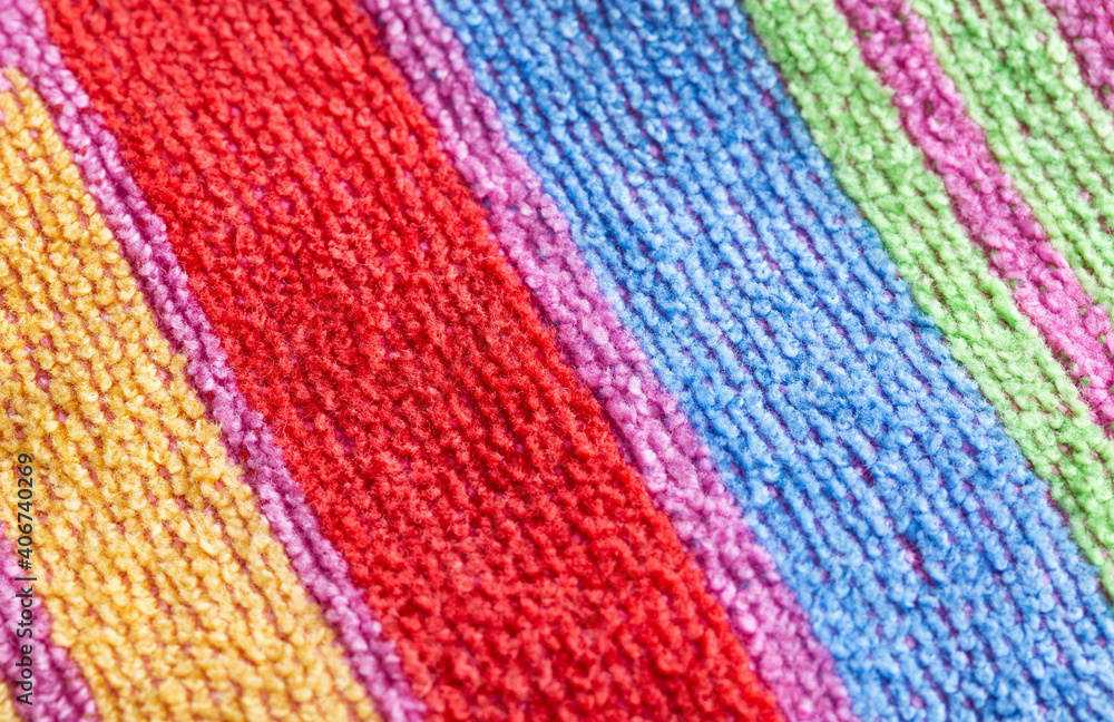 Multicolor fleece fabric with stripes, macro. Backdrop