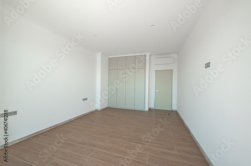 Empty room with built-in wardrobe. interior design concept.